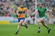 5 June 2022; Tony Kelly of Clare in action against William O'Donoghue of Limerick during the Munster GAA Hurling Senior Championship Final match between Limerick and Clare at FBD Semple Stadium in Thurles, Tipperary. Photo by Brendan Moran/Sportsfile