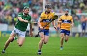 5 June 2022; Tony Kelly of Clare in action against William O'Donoghue of Limerick during the Munster GAA Hurling Senior Championship Final match between Limerick and Clare at FBD Semple Stadium in Thurles, Tipperary. Photo by Brendan Moran/Sportsfile