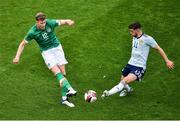 11 June 2022; Nathan Collins of Republic of Ireland and Ryan Christie of Scotland during the UEFA Nations League B group 1 match between Republic of Ireland and Scotland at the Aviva Stadium in Dublin. Photo by Ben McShane/Sportsfile