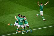 11 June 2022; Michael Obafemi of Republic of Ireland celebrates with teammates, from left, Troy Parrott, Alan Browne and Jason Knight, after scoring his side's third goal during the UEFA Nations League B group 1 match between Republic of Ireland and Scotland at the Aviva Stadium in Dublin. Photo by Ben McShane/Sportsfile