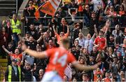 12 June 2022; Armagh supporters celebrate their side's second goal, a penalty scored by Rian O'Neill, during the GAA Football All-Ireland Senior Championship Round 2 match between between Donegal and Armagh at St Tiernach's Park in Clones, Monaghan. Photo by Seb Daly/Sportsfile