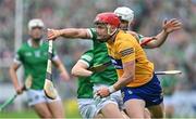 5 June 2022; Paul Flanagan of Clare in action against Aaron Gillane of Limerick during the Munster GAA Hurling Senior Championship Final match between Limerick and Clare at FBD Semple Stadium in Thurles, Tipperary. Photo by Brendan Moran/Sportsfile