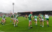 5 June 2022; Seán Finn of Limerick, second from right, encourages his teammates as they leave the parade before the Munster GAA Hurling Senior Championship Final match between Limerick and Clare at FBD Semple Stadium in Thurles, Tipperary. Photo by Brendan Moran/Sportsfile