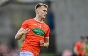 12 June 2022; Rian O'Neill of Armagh celebrates kicking a point during the GAA Football All-Ireland Senior Championship Round 2 match between between Donegal and Armagh at St Tiernach's Park in Clones, Monaghan. Photo by Ramsey Cardy/Sportsfile