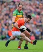 12 June 2022; Aidan Forker of Armagh in action against Michael Murphy of Donegal during the GAA Football All-Ireland Senior Championship Round 2 match between between Donegal and Armagh at St Tiernach's Park in Clones, Monaghan. Photo by Ramsey Cardy/Sportsfile