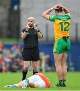 12 June 2022; Michael Langan of Donegal reacts to a decision by referee Brendan Cawley during the GAA Football All-Ireland Senior Championship Round 2 match between between Donegal and Armagh at St Tiernach's Park in Clones, Monaghan. Photo by Ramsey Cardy/Sportsfile