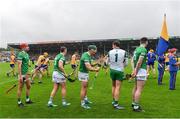 5 June 2022; Seán Finn of Limerick, centre, encourages his teammates as they leave the parade before the Munster GAA Hurling Senior Championship Final match between Limerick and Clare at FBD Semple Stadium in Thurles, Tipperary. Photo by Brendan Moran/Sportsfile