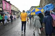 5 June 2022; Supporters make their way through the town to the stadium before the Munster GAA Hurling Senior Championship Final match between Limerick and Clare at FBD Semple Stadium in Thurles, Tipperary. Photo by Brendan Moran/Sportsfile
