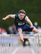 4 June 2022; Adam Nolan of Scoil Chonglais Baltinglass, Wicklow, on his way to winning the senior boys 110m hurdles at the Irish Life Health All Ireland Schools Track and Field Championships at Tullamore in Offaly. Photo by Sam Barnes/Sportsfile