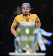 5 June 2022; Cian Nolan of Clare runs onto the pitch past the Mick Mackey cup before the Munster GAA Hurling Senior Championship Final match between Limerick and Clare at FBD Semple Stadium in Thurles, Tipperary. Photo by Brendan Moran/Sportsfile