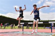 4 June 2022; Ethan Doherty of Rice College Westport, Mayo, right, and Ben Acheson of Campbell College Belfast, competing in the intermediate boys 1500m steeplechase  at the Irish Life Health All Ireland Schools Track and Field Championships at Tullamore in Offaly. Photo by Sam Barnes/Sportsfile