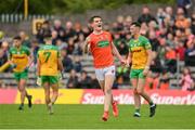12 June 2022; Jarly Og Burns of Armagh celebrates scoring a point during the GAA Football All-Ireland Senior Championship Round 2 match between between Donegal and Armagh at St Tiernach's Park in Clones, Monaghan. Photo by Seb Daly/Sportsfile