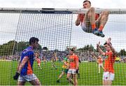 12 June 2022; Rian O'Neill of Armagh hangs on the crossbar during the GAA Football All-Ireland Senior Championship Round 2 match between between Donegal and Armagh at St Tiernach's Park in Clones, Monaghan. Photo by Seb Daly/Sportsfile