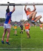 12 June 2022; Rian O'Neill of Armagh hangs on the crossbar during the GAA Football All-Ireland Senior Championship Round 2 match between between Donegal and Armagh at St Tiernach's Park in Clones, Monaghan. Photo by Seb Daly/Sportsfile