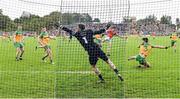 12 June 2022; Rory Grugan of Armagh scores his side's first goal, past Donegal goalkeeper Shaun Patton, during the GAA Football All-Ireland Senior Championship Round 2 match between between Donegal and Armagh at St Tiernach's Park in Clones, Monaghan. Photo by Seb Daly/Sportsfile
