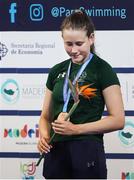 12 June 2022; Roisin Ni Riain of Ireland with her bronze medal after the final of the 100m butterfly S13 class during day one of the 2022 World Para Swimming Championships at the Complexo de Piscinas Olímpicas do Funchal in Madeira, Portugal. Photo by Ian MacNicol/Sportsfile