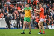 12 June 2022; Rian O'Neill of Armagh points out Donegal's Caolan McGonagle during the GAA Football All-Ireland Senior Championship Round 2 match between between Donegal and Armagh at St Tiernach's Park in Clones, Monaghan. Photo by Seb Daly/Sportsfile