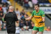 12 June 2022; Caolan McGonagle of Donegal remonstrates with referee Brendan Cawley during the GAA Football All-Ireland Senior Championship Round 2 match between between Donegal and Armagh at St Tiernach's Park in Clones, Monaghan. Photo by Seb Daly/Sportsfile