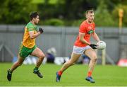 12 June 2022; Rian O'Neill of Armagh in action against Brendan McCole of Donegal during the GAA Football All-Ireland Senior Championship Round 2 match between between Donegal and Armagh at St Tiernach's Park in Clones, Monaghan. Photo by Seb Daly/Sportsfile
