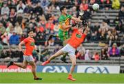 12 June 2022; Michael Langan of Donegal in action against Jarly Og Burns of Armagh during the GAA Football All-Ireland Senior Championship Round 2 match between between Donegal and Armagh at St Tiernach's Park in Clones, Monaghan. Photo by Seb Daly/Sportsfile