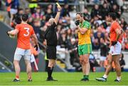 12 June 2022; Michael Murphy of Donegal is shown a yellow card by referee Brendan Cawley during the GAA Football All-Ireland Senior Championship Round 2 match between between Donegal and Armagh at St Tiernach's Park in Clones, Monaghan. Photo by Seb Daly/Sportsfile