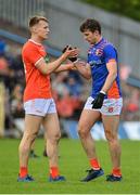 12 June 2022; Rian O'Neill, left, and goalkeeper Ethan Rafferty of Armagh during the GAA Football All-Ireland Senior Championship Round 2 match between between Donegal and Armagh at St Tiernach's Park in Clones, Monaghan. Photo by Seb Daly/Sportsfile