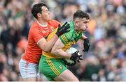 12 June 2022; Patrick McBrearty of Donegal is tackled by Aaron McKay of Armagh during the GAA Football All-Ireland Senior Championship Round 2 match between between Donegal and Armagh at St Tiernach's Park in Clones, Monaghan. Photo by Ramsey Cardy/Sportsfile