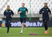 13 June 2022; Damien Doyle, head of athletic performance, left, with James McClean and Troy Parrott, right, during a Republic of Ireland training session at LKS Stadium in Lodz, Poland. Photo by Stephen McCarthy/Sportsfile