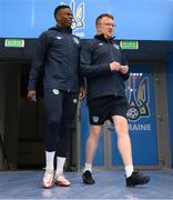 13 June 2022; Chiedozie Ogbene and Andrew Morrissey, STATSports analyst, right, arrive for a Republic of Ireland training session at LKS Stadium in Lodz, Poland. Photo by Stephen McCarthy/Sportsfile