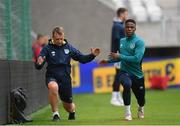 13 June 2022; Chiedozie Ogbene and Danny Miller, chartered physiotherapist, during a Republic of Ireland training session at LKS Stadium in Lodz, Poland. Photo by Stephen McCarthy/Sportsfile