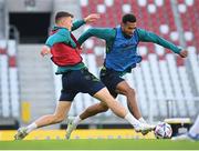 13 June 2022; Cyrus Christie is tackled by Dara O'Shea during a Republic of Ireland press conference at LKS Stadium in Lodz, Poland. Photo by Stephen McCarthy/Sportsfile
