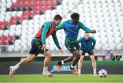 13 June 2022; Festy Ebosele and Enda Stevens, left, during a Republic of Ireland training session at LKS Stadium in Lodz, Poland. Photo by Stephen McCarthy/Sportsfile