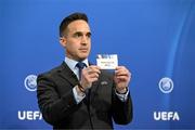14 June 2022; UEFA Senior Competitions Manager Tom Barlow draws out the card of Hibernians FC during the UEFA Champions League 2022/23 First Qualifying Round draw at the UEFA headquarters, in Nyon, Switzerland. Photo by Kristian Skeie - UEFA via Sportsfile
