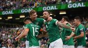 11 June 2022; Republic of Ireland players, from left, Jayson Molumby, Nathan Collins and Shane Duffy celebrate after Alan Browne scored their opening goal during the UEFA Nations League B group 1 match between Republic of Ireland and Scotland at the Aviva Stadium in Dublin. Photo by Stephen McCarthy/Sportsfile