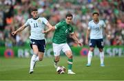 11 June 2022; Josh Cullen of Republic of Ireland in action against Ryan Christie of Scotland during the UEFA Nations League B group 1 match between Republic of Ireland and Scotland at the Aviva Stadium in Dublin. Photo by Stephen McCarthy/Sportsfile