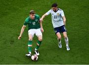 11 June 2022; Nathan Collins of Republic of Ireland and Ryan Christie of Scotland during the UEFA Nations League B group 1 match between Republic of Ireland and Scotland at the Aviva Stadium in Dublin. Photo by Ben McShane/Sportsfile