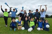 14 June 2022; St Oliver’s National School in Killarney, Kerry, was among twenty-six schools across the country that have joined an initiative organised between Allianz and Cumann na mBunscol, that will support Ukrainian schoolchildren participate in local Gaelic game activities through their schools. The initiative sees Allianz provide these schools with 500 footballs, 200 hurleys and 200 sliothars to help Ukrainian refugee schoolchildren fall in love with our national games and integrate into their local communities. Pictured are local and Ukranian students from St Oliver’s National School. Photo by Brendan Moran/Sportsfile