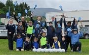 14 June 2022; St Oliver’s National School in Killarney, Kerry, was among twenty-six schools across the country that have joined an initiative organised between Allianz and Cumann na mBunscol, that will support Ukrainian schoolchildren participate in local Gaelic game activities through their schools. The initiative sees Allianz provide these schools with 500 footballs, 200 hurleys and 200 sliothars to help Ukrainian refugee schoolchildren fall in love with our national games and integrate into their local communities. Pictured are students from St Oliver’s National School with 5th class teacher Brendan Kealy, Allianz schools rep Martin Keogh and school principal Colm O Suilleabháin. Photo by Brendan Moran/Sportsfile