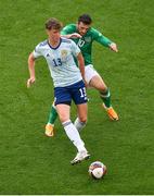 11 June 2022; Jack Hendry of Scotland and Troy Parrott of Republic of Ireland during the UEFA Nations League B group 1 match between Republic of Ireland and Scotland at the Aviva Stadium in Dublin. Photo by Ben McShane/Sportsfile