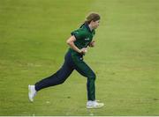 14 June 2022; Georgina Dempsey of Ireland running into bowl during the Women's one day international match between Ireland and South Africa at Clontarf Cricket Club in Dublin. Photo by George Tewkesbury/Sportsfile