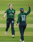 14 June 2022; Georgina Dempsey of Ireland, left, celebrates with team mate Leah Paul as they take their sides first wicket during the Women's one day international match between Ireland and South Africa at Clontarf Cricket Club in Dublin. Photo by George Tewkesbury/Sportsfile