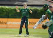 14 June 2022; Georgina Dempsey of Ireland reacts as her ball is hit for four during the Women's one day international match between Ireland and South Africa at Clontarf Cricket Club in Dublin. Photo by George Tewkesbury/Sportsfile
