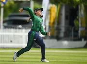14 June 2022; Sarah Forbes of Ireland throwing the ball during the Women's one day international match between Ireland and South Africa at Clontarf Cricket Club in Dublin. Photo by George Tewkesbury/Sportsfile