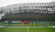 11 June 2022; Players, officials and mascots stand for the playing of the National Anthem before the UEFA Nations League B group 1 match between Republic of Ireland and Scotland at the Aviva Stadium in Dublin. Photo by Stephen McCarthy/Sportsfile