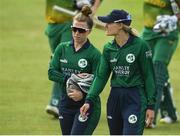 14 June 2022; Mary Waldron of Ireland, left, in discussion with Ireland captain Gaby Lewis after their side's defeat during the Women's one day international match between Ireland and South Africa at Clontarf Cricket Club in Dublin. Photo by George Tewkesbury/Sportsfile