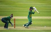 14 June 2022; Mary Waldron of Ireland, left, watches Andrie Steyn of South Africa hit the ball away during the Women's one day international match between Ireland and South Africa at Clontarf Cricket Club in Dublin. Photo by George Tewkesbury/Sportsfile