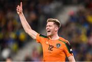 14 June 2022; Nathan Collins of Republic of Ireland celebrates after scoring his side's first goal during the UEFA Nations League B group 1 match between Ukraine and Republic of Ireland at LKS Stadium in Lodz, Poland. Photo by Stephen McCarthy/Sportsfile