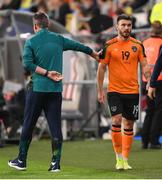 14 June 2022; Scott Hogan of Republic of Ireland with Republic of Ireland manager Stephen Kenny after being substituted off the pitch during the UEFA Nations League B group 1 match between Ukraine and Republic of Ireland at LKS Stadium in Lodz, Poland. Photo by Stephen McCarthy/Sportsfile