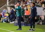 14 June 2022; Republic of Ireland manager Stephen Kenny, left, and Republic of Ireland coach Keith Andrews during the UEFA Nations League B group 1 match between Ukraine and Republic of Ireland at LKS Stadium in Lodz, Poland. Photo by Stephen McCarthy/Sportsfile