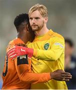 14 June 2022; Republic of Ireland goalkeeper Caoimhin Kelleher, right, and Chiedozie Ogbene after the UEFA Nations League B group 1 match between Ukraine and Republic of Ireland at LKS Stadium in Lodz, Poland. Photo by Stephen McCarthy/Sportsfile